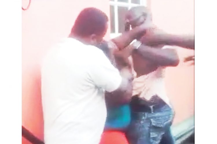 Woman, police in scuffle over alleged stolen drum
