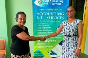 Accounting, IT firm makes donation to St Vincent Grammar School
