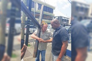 US Christian  bears a cross for his faith