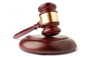 Teacher charged with wounding