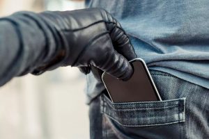 Women charged with stealing lawyer’s phone