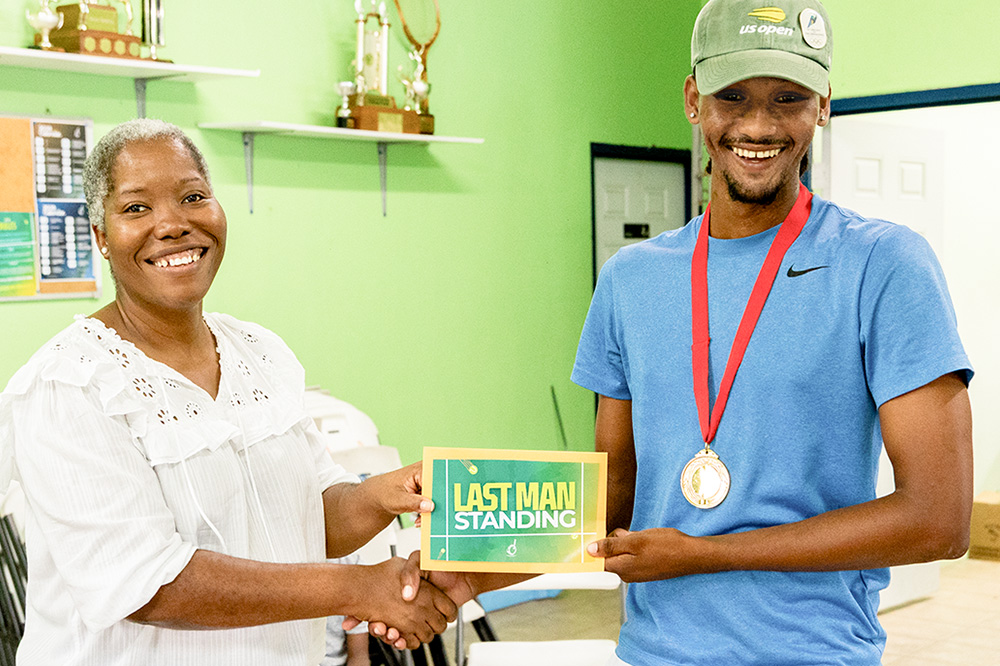 Afi Lucas is Tennis’ Last Man Standing Tennis champion