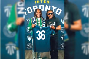 Ty Clarke inks multi- year professional Football contract